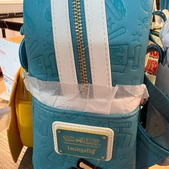 Loungefly Tom & Jerry Blue Gray Pink Faux Fur Backpack with Yellow Cheese Pocket - Picture 3 of 6